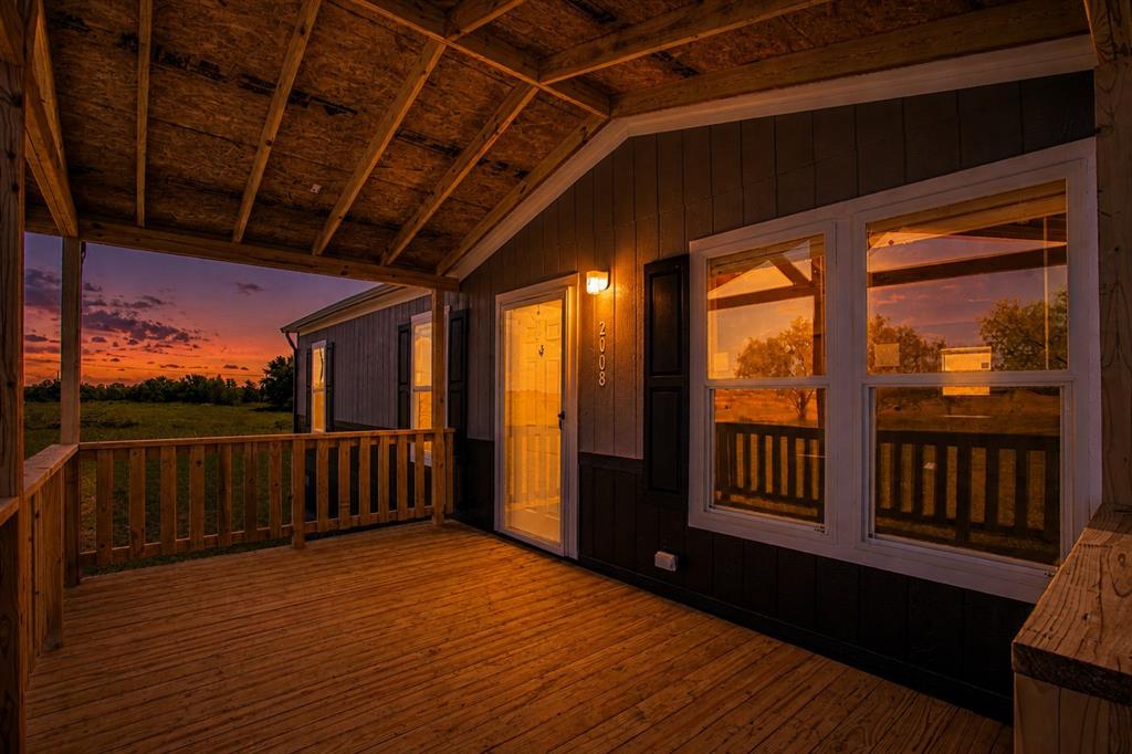 2008 Buffet Way Poolville, TX 76487 - Photo 2 of 40 a view of porch with deck