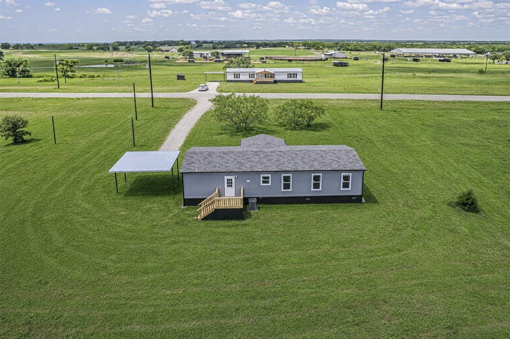 2008 Buffet Way Poolville, TX 76487 - Photo 35 of 40 a view of a garden with an outdoor space