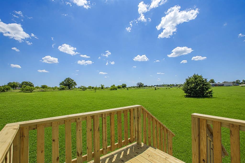 2008 Buffet Way Poolville, TX 76487 - Photo 37 of 40 a view of a balcony with yard
