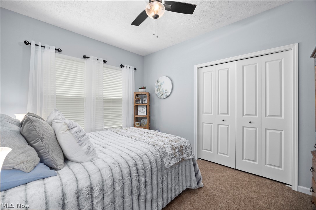 109 West Spring Drive Elyria, OH 44035 - Photo 28 of 46 Recessed window featuring white cellular blinds and sheer curtains