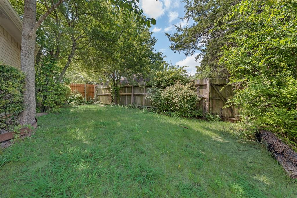 225 Juniper Ridge Court DeSoto, TX 75115 - Photo 16 of 17 a view of a backyard with a garden