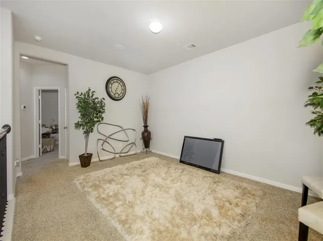 a view of a livingroom with furniture