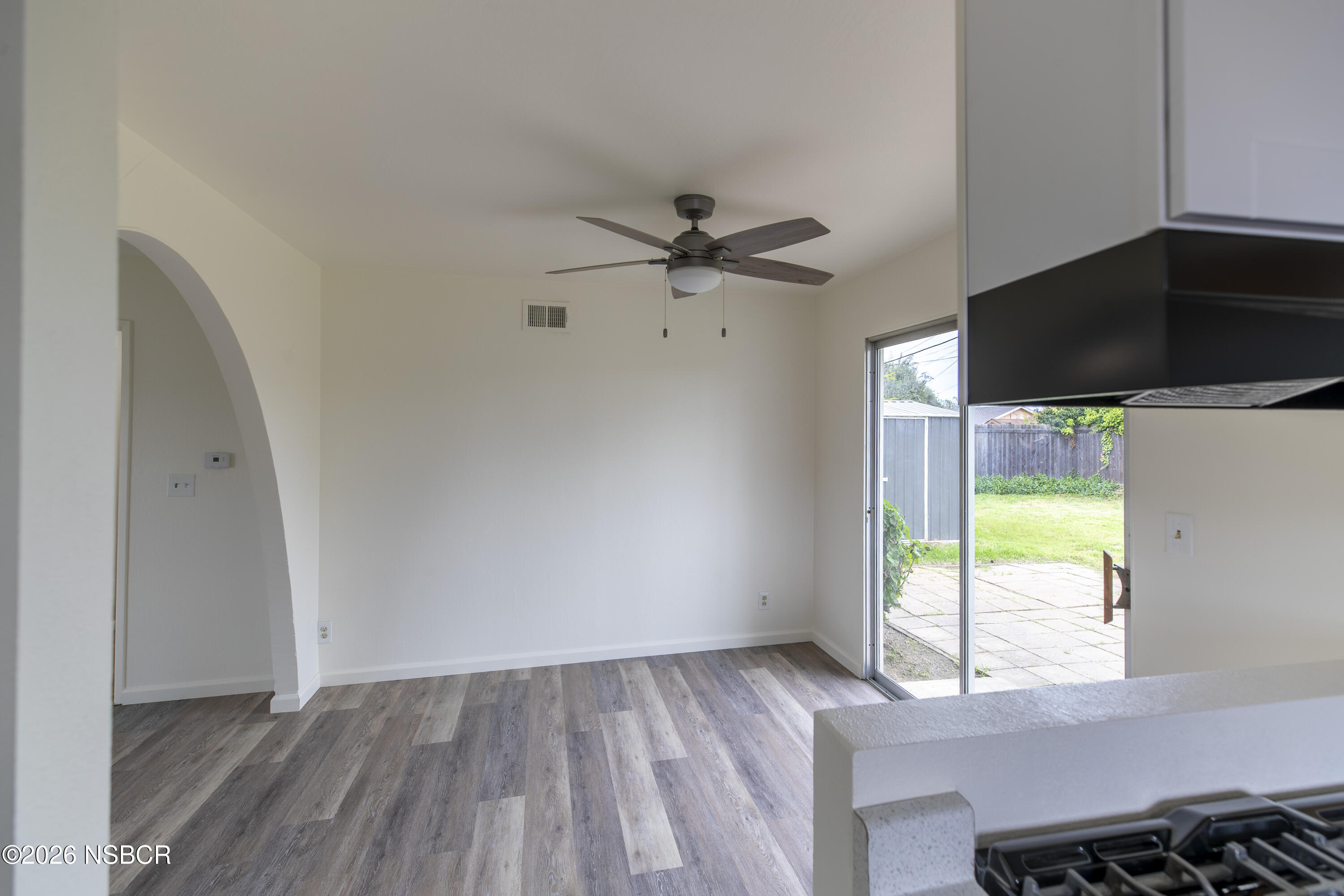 901 Alden Avenue Lompoc, CA 93436 - Photo 13 of 42 wooden floor in an empty room with a window
