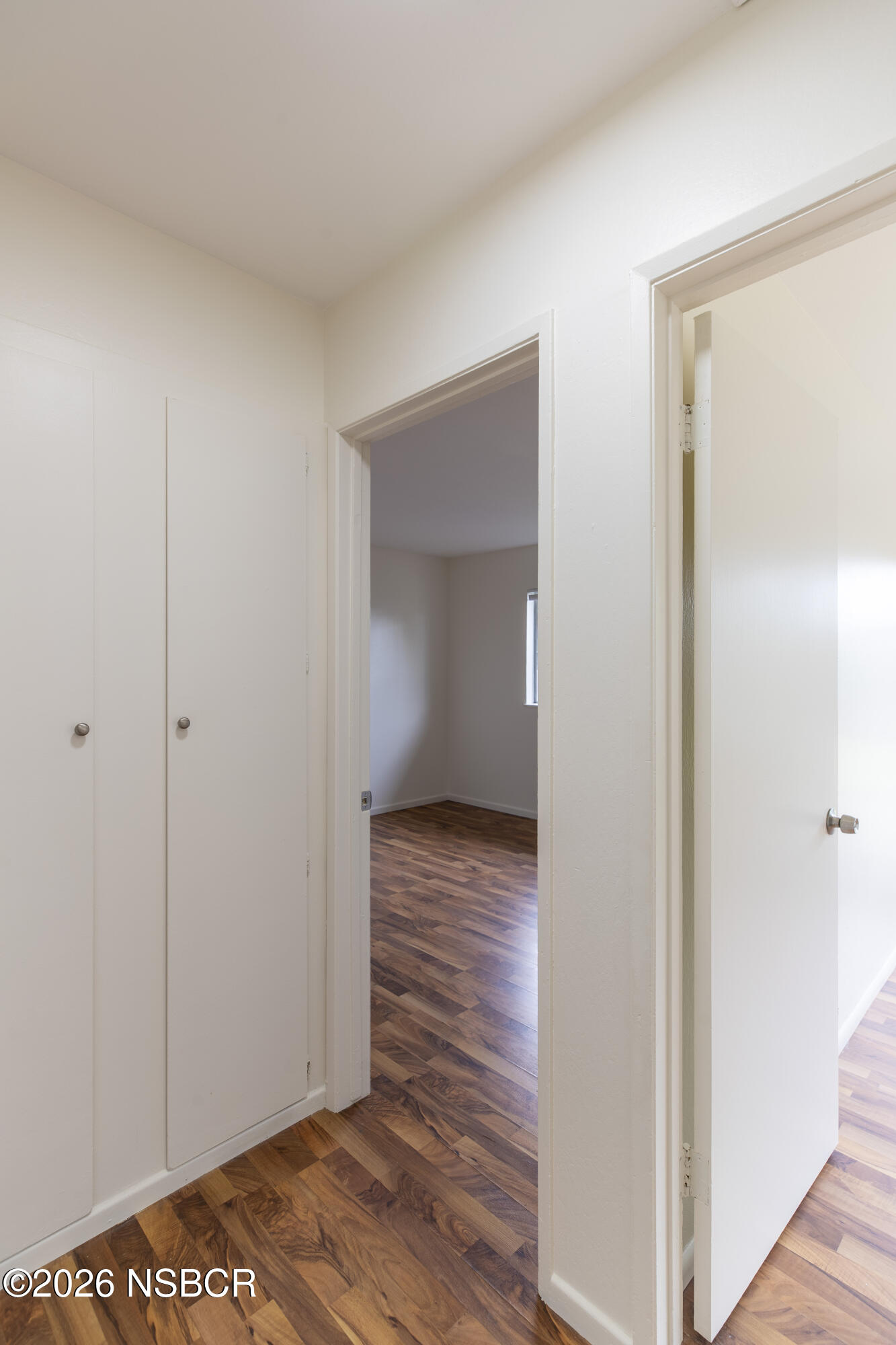 901 Alden Avenue Lompoc, CA 93436 - Photo 17 of 42 a view of an empty room and wooden floor