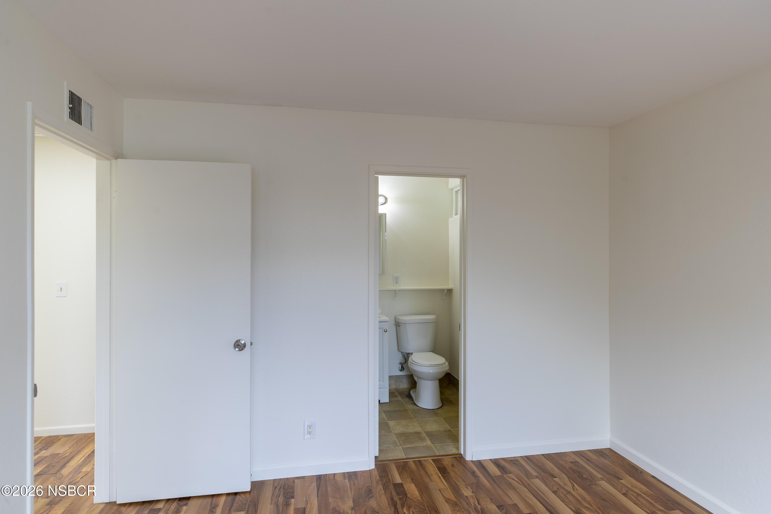 901 Alden Avenue Lompoc, CA 93436 - Photo 21 of 42 a view of a room with wooden floor and bathroom view