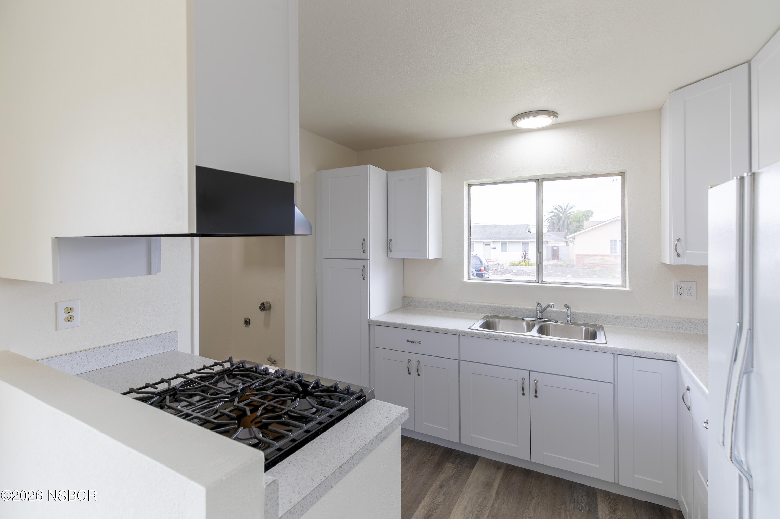 901 Alden Avenue Lompoc, CA 93436 - Photo 8 of 42 a kitchen with sink stove and window