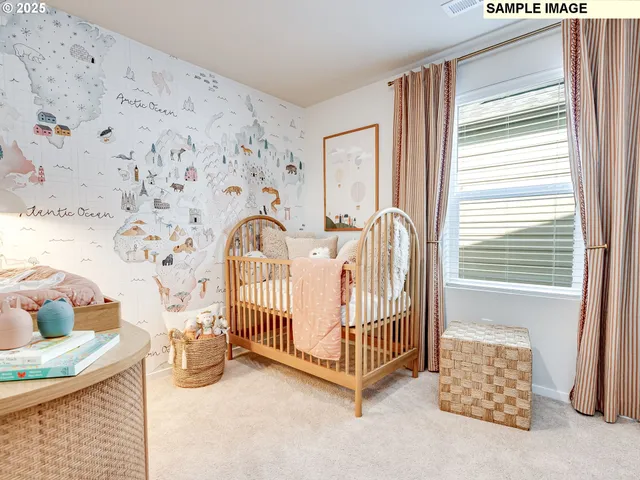 a view of a bedroom and a window