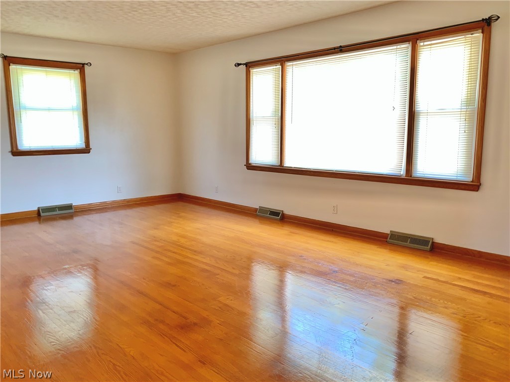 64216 Morrison Road Cambridge, OH 43725 - Photo 4 of 32 Large Living Room with gleaming hardwood floors