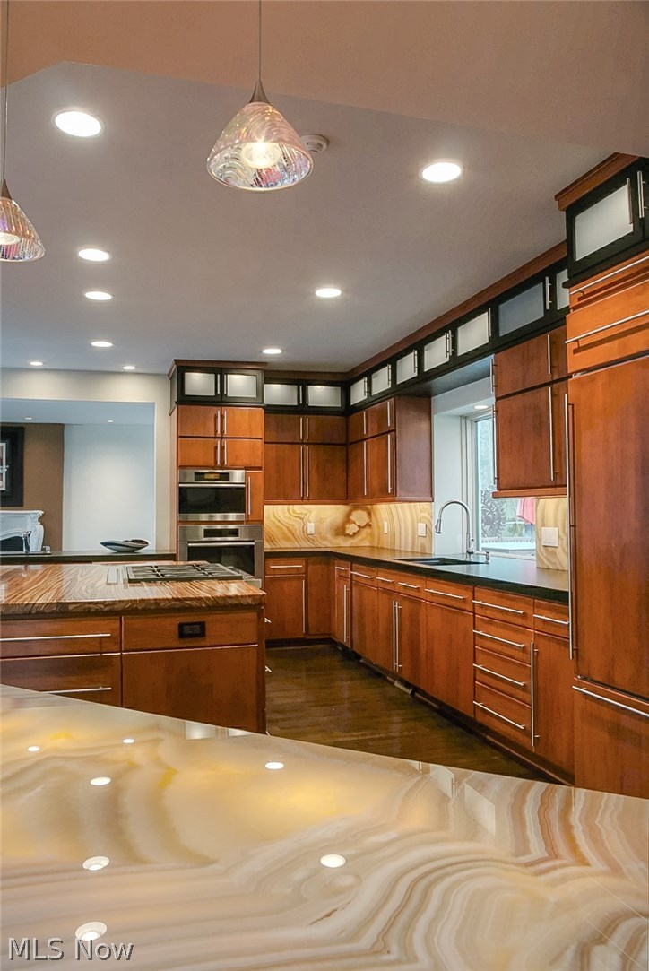 Onyx counter top in bar area and on blacksplash.