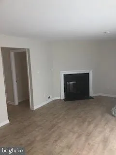 a bathroom with a sink toilet and mirror