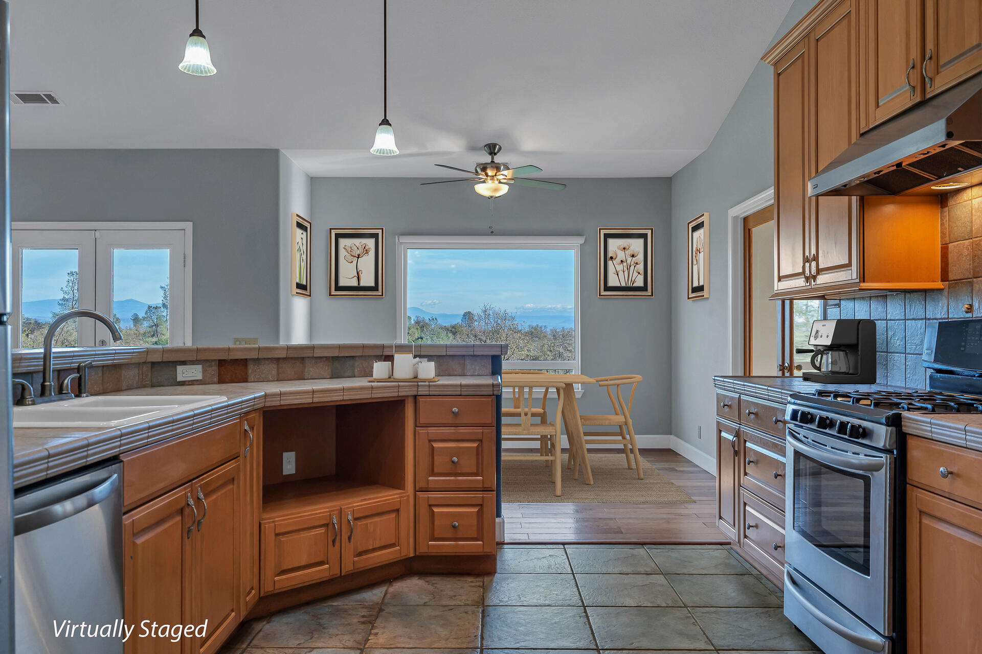 13303 Intermountain Road Redding, CA 96003 - Photo 39 of 64 a kitchen with a sink cabinets and stainless steel appliances