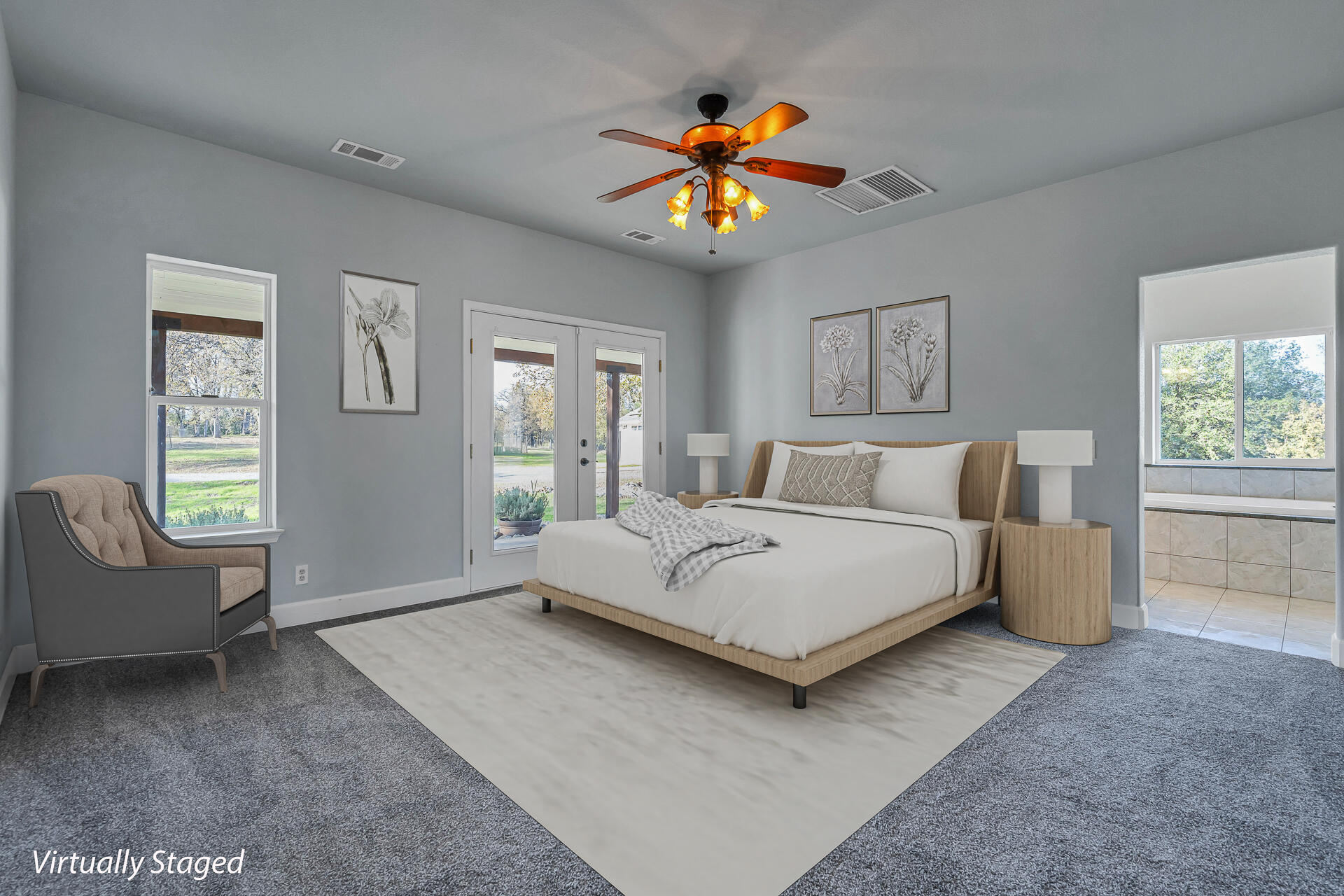 13303 Intermountain Road Redding, CA 96003 - Photo 41 of 64 a spacious bedroom with a bed and a couch