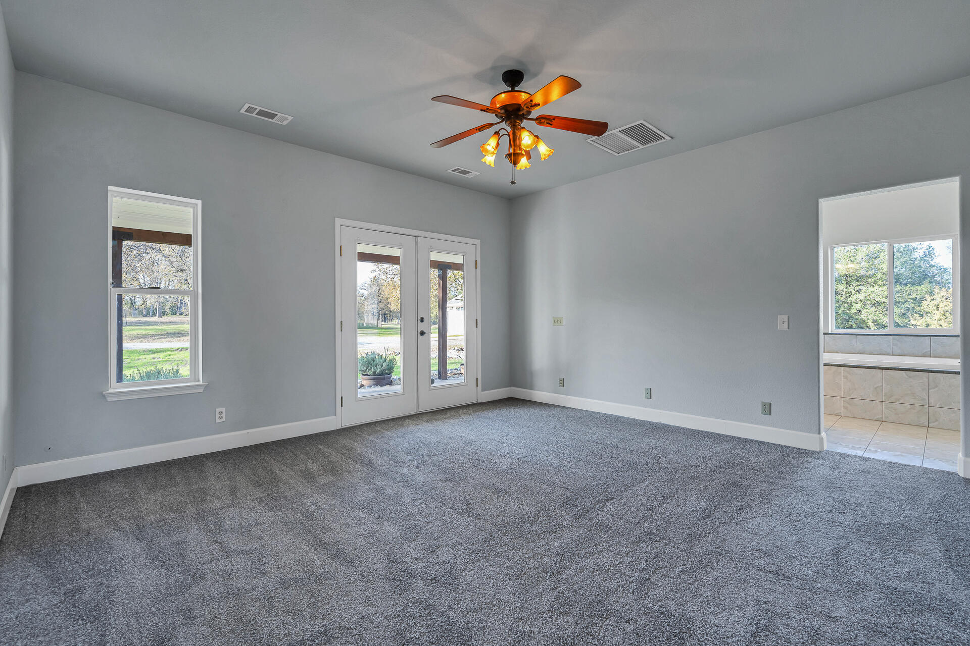 13303 Intermountain Road Redding, CA 96003 - Photo 42 of 64 a view of an empty room with a window
