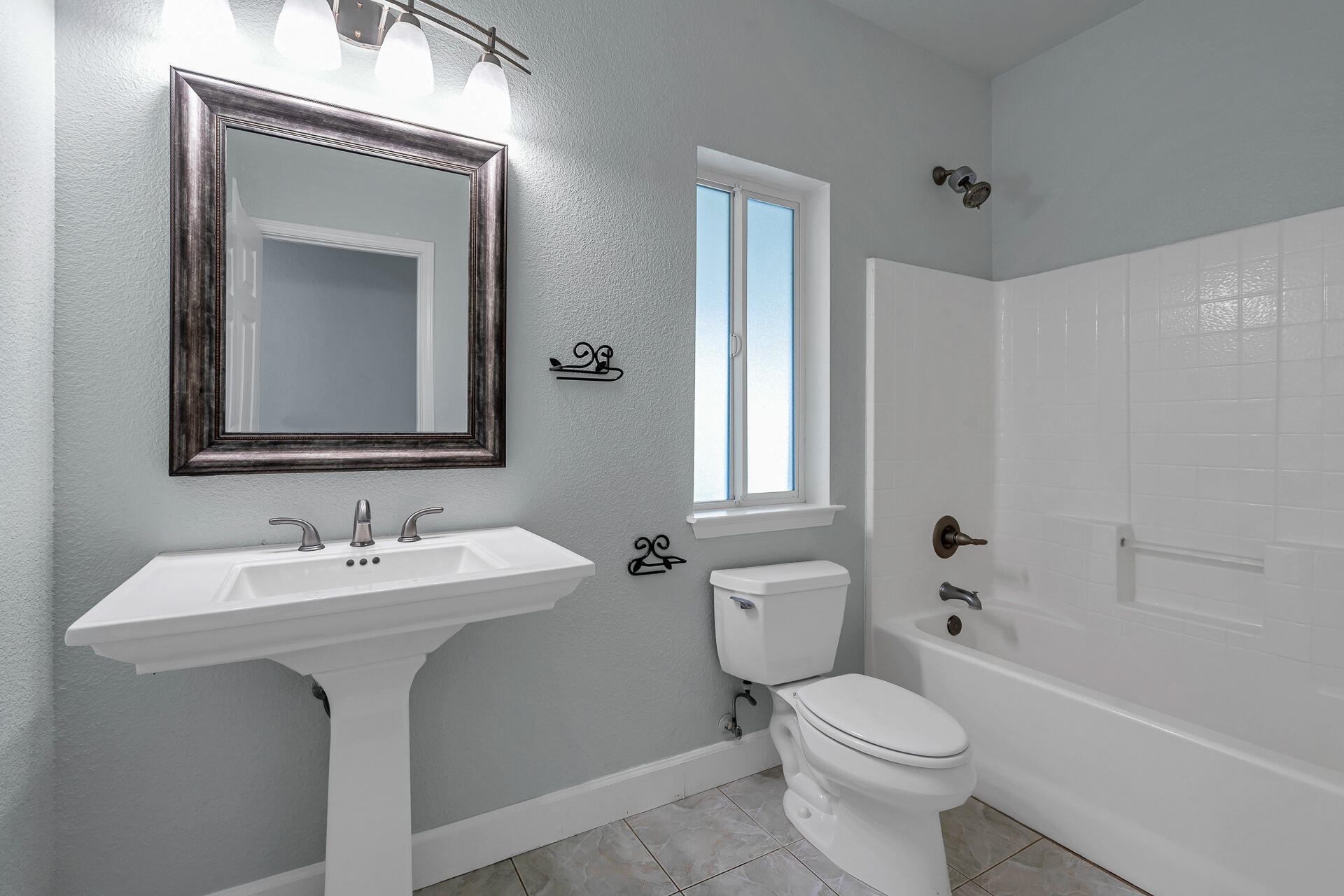 13303 Intermountain Road Redding, CA 96003 - Photo 53 of 64 a bathroom with a toilet sink and mirror