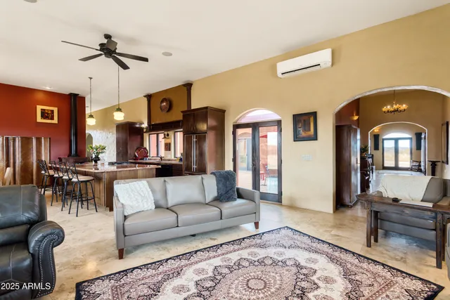 a living room with furniture and a couch