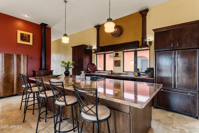 a view of hallway with a door and a mirror