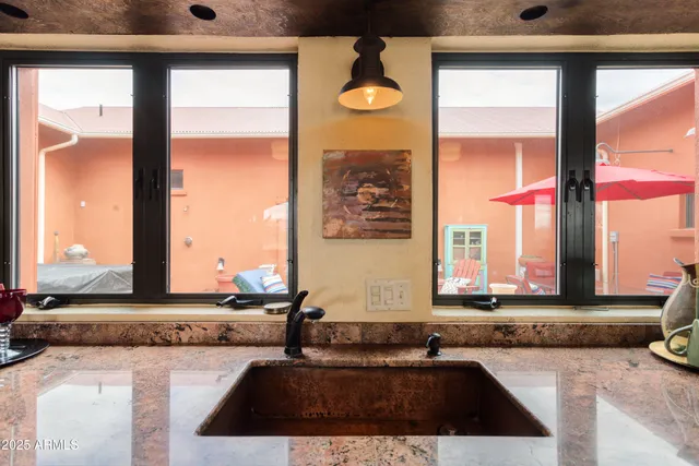 a view of a bathroom from a hallway