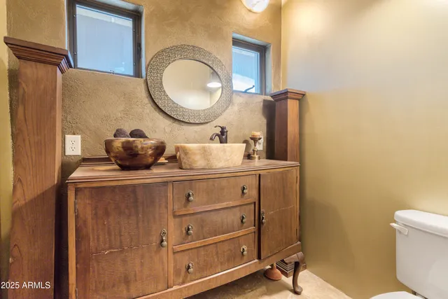a view of a livingroom with furniture and windows