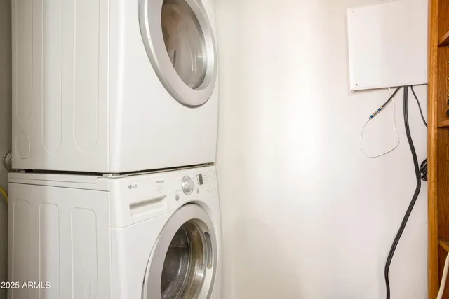 a living room with furniture fireplace and a flat screen tv