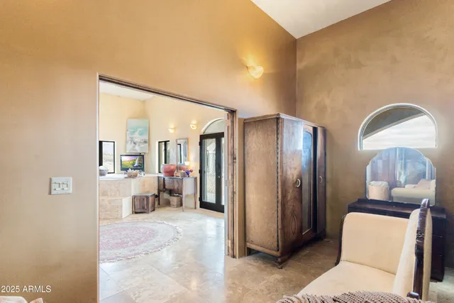 a kitchen with a potted plant on the counter and cabinets