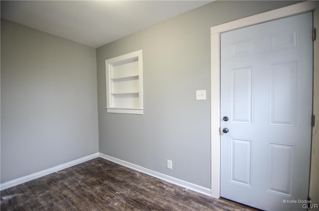 606 Hayes Street Bethlehem, PA 18015 - Photo 2 of 12 a view of an empty room with closet and a window