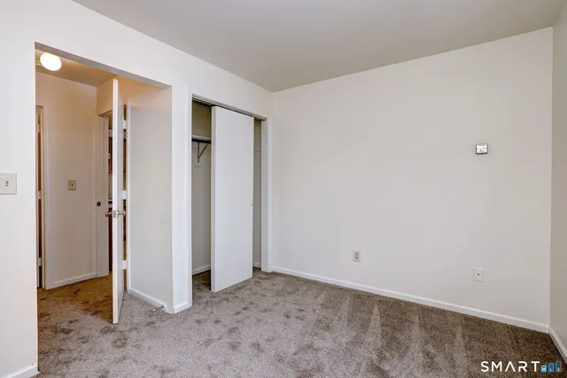 a view of a room with a sink and a window