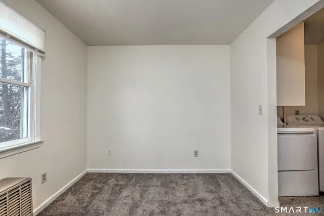 a view of a bathroom with a bathroom