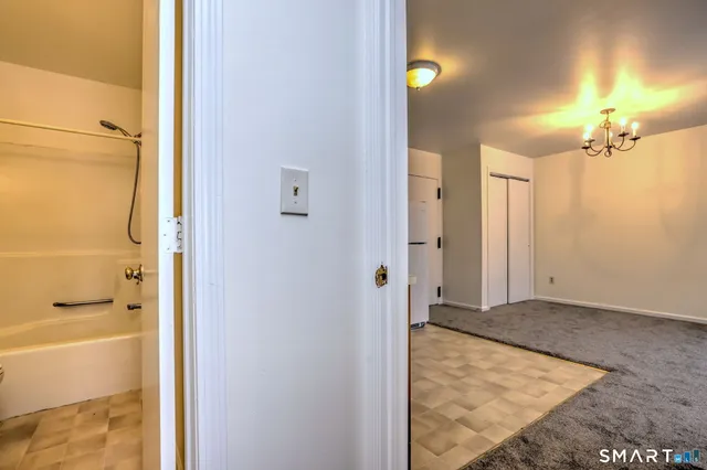 an aerial view of multiple houses with yard