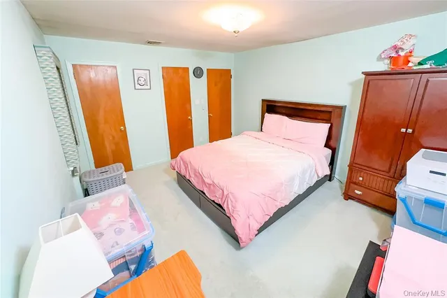 a view of empty room with red walls