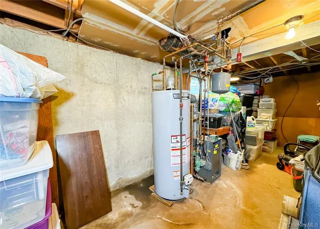 a bathroom with a sink toilet and mirror