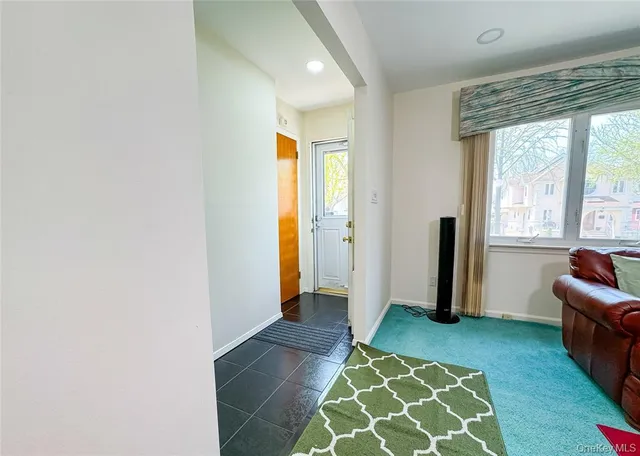 a view of empty room with windows