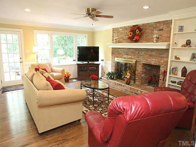 5024 Trail Ridge Drive Raleigh, NC 27613 - Photo 11 of 25 Super family room w/built-ins, hardwood floors, lots of light w/view of backyard Den/Family/Great Room
