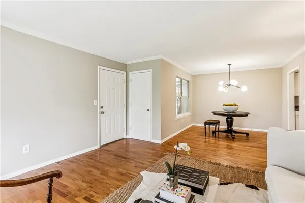 a bedroom with a bed and a table in it