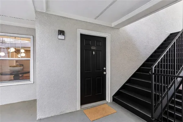 a view of an entryway with staircase