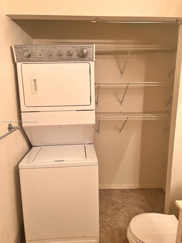 17 Crossings Circle, Unit E Boynton Beach, FL 33435 - Photo 14 of 20 a close up view of a washer and dryer