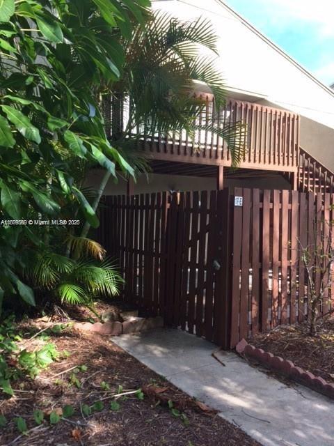 17 Crossings Circle, Unit E Boynton Beach, FL 33435 - Photo 5 of 20 a view of a pathway of a building