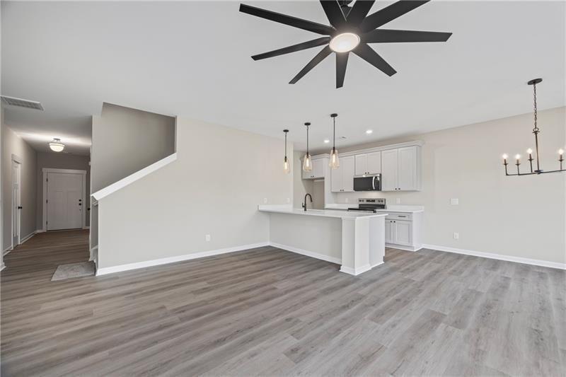 693 Racetrack Road Toccoa, GA 30577 - Photo 12 of 45 a view of kitchen with sink and wooden floor