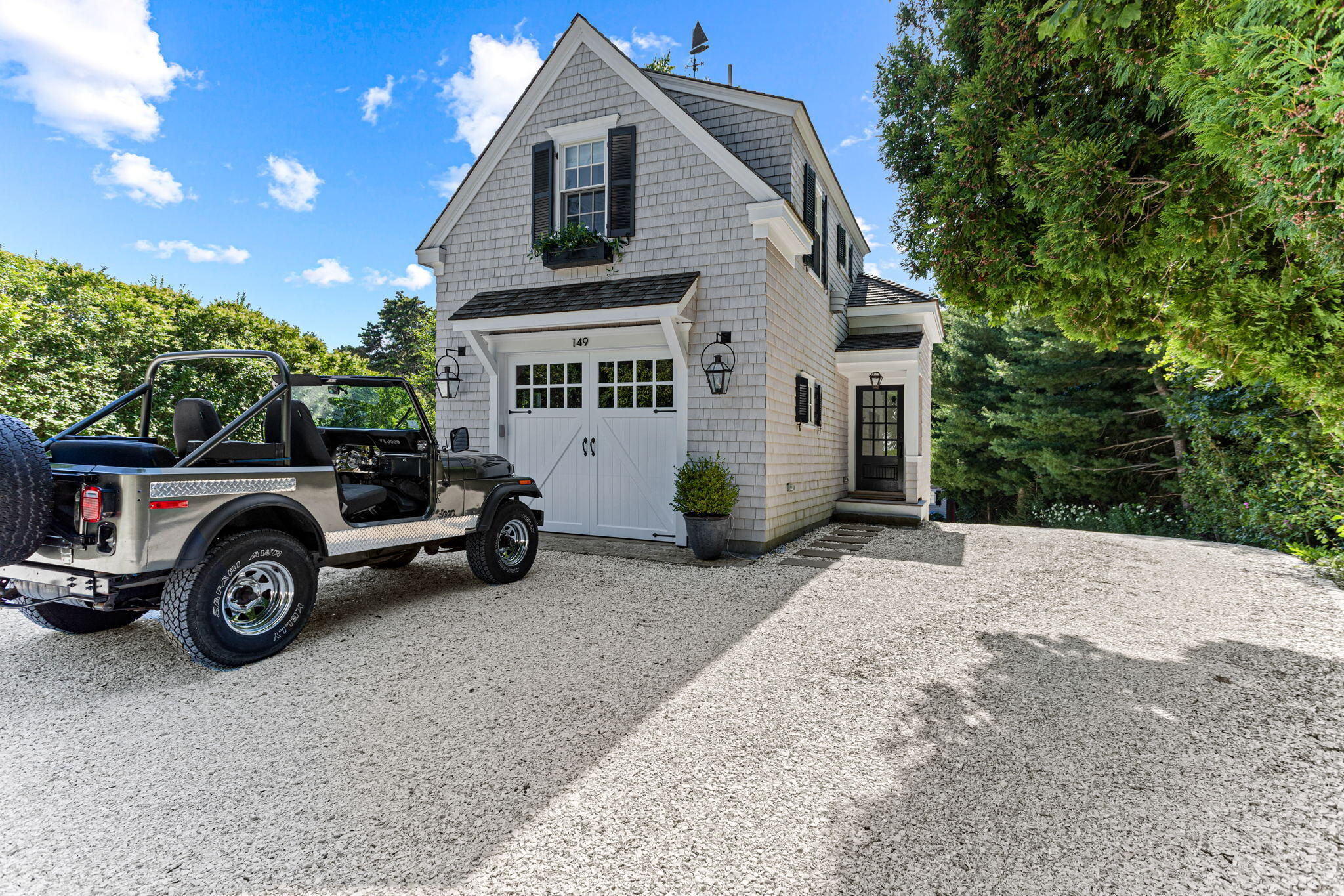 149 Old Stage Road Centerville, MA 02632 - Photo 12 of 69 a view of a house with a yard and parking space