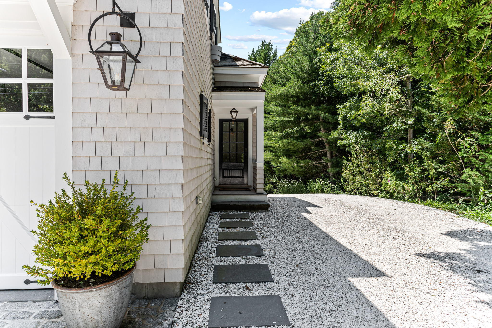 149 Old Stage Road Centerville, MA 02632 - Photo 13 of 69 a view of a pathway along with potted plants