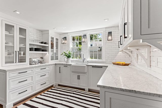 a bathroom with a sink and a bathtub
