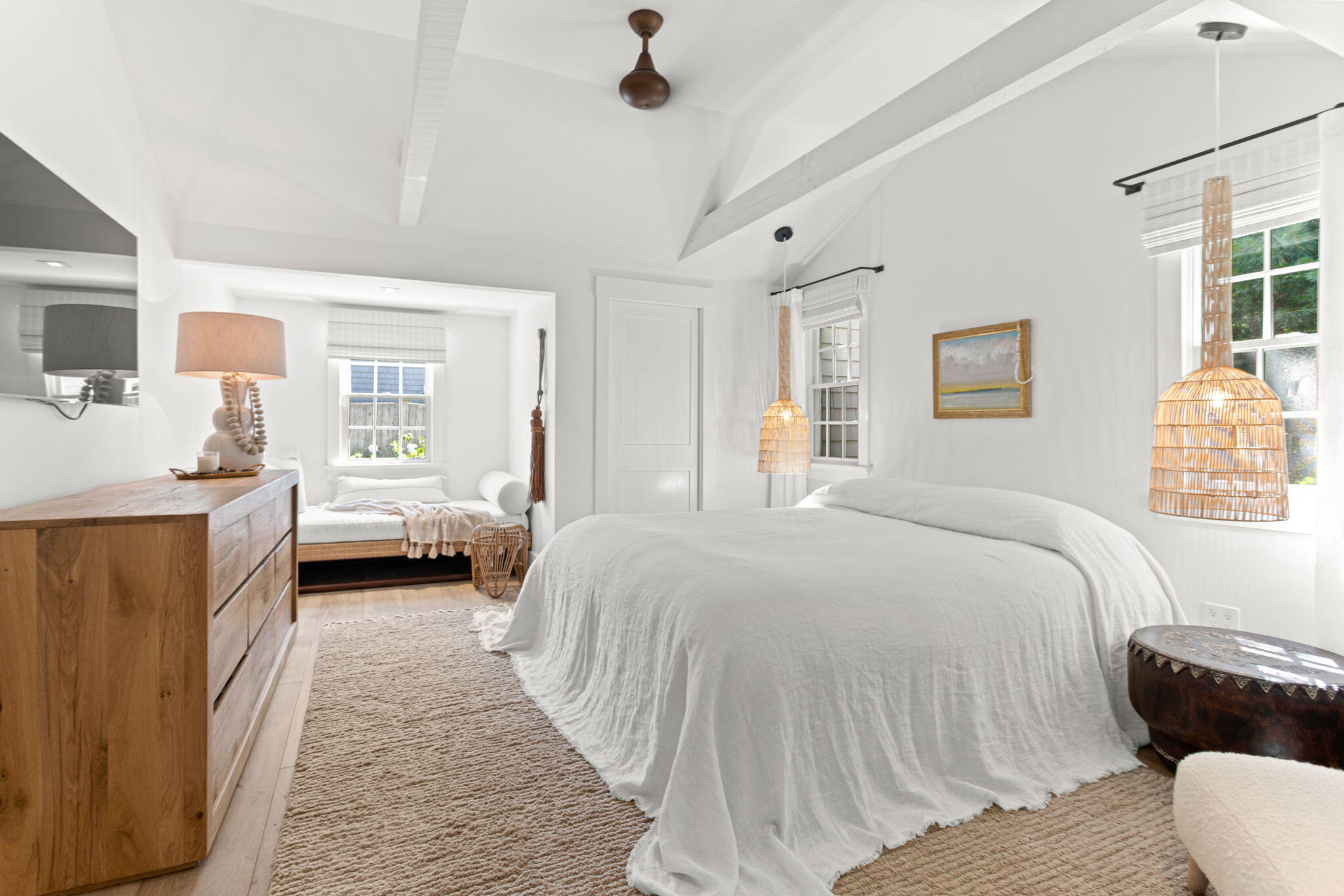 149 Old Stage Road Centerville, MA 02632 - Photo 25 of 69 a spacious bedroom with a bed couch and a window