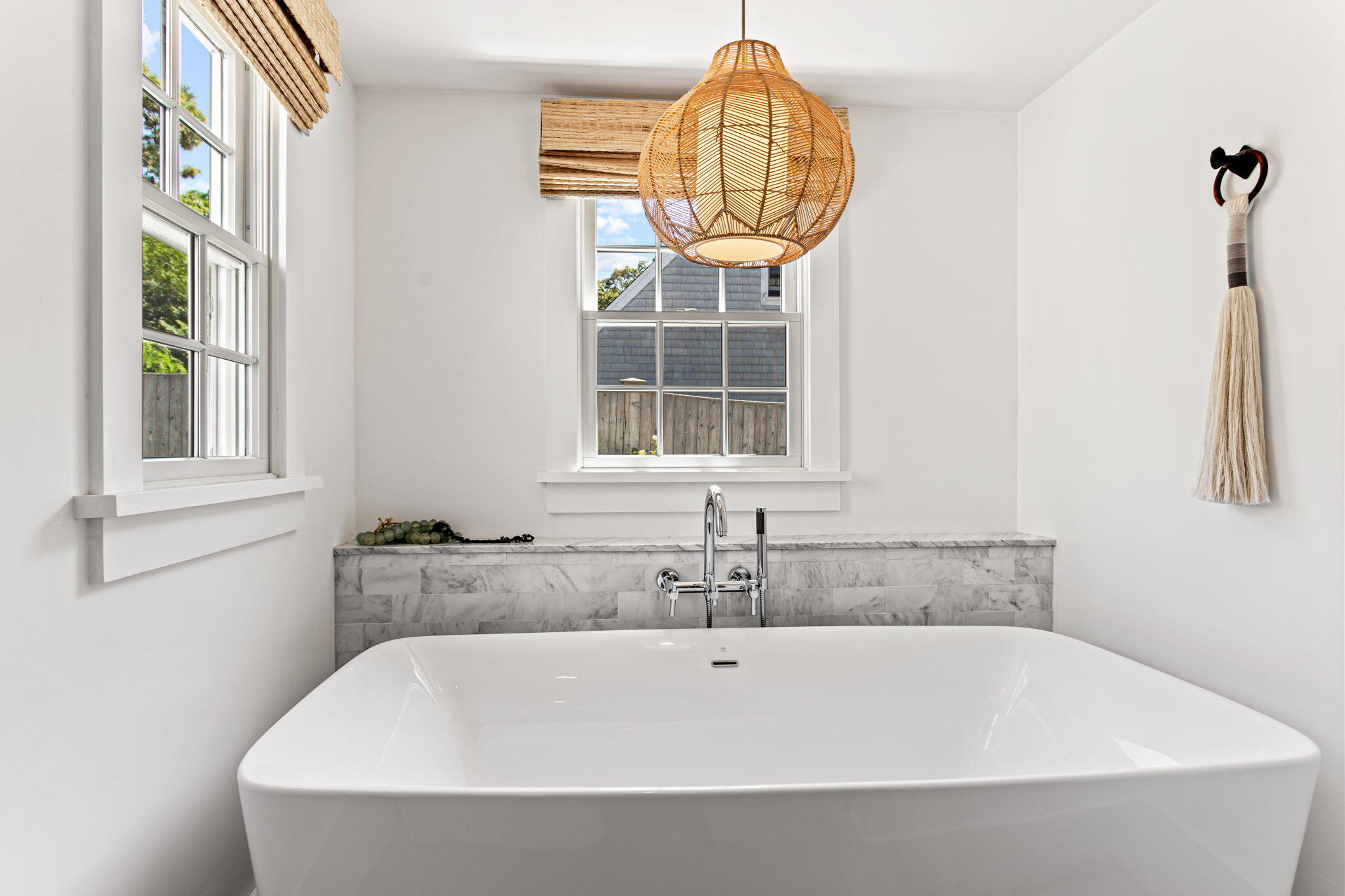 149 Old Stage Road Centerville, MA 02632 - Photo 29 of 69 a bathroom with a bathtub and a sink
