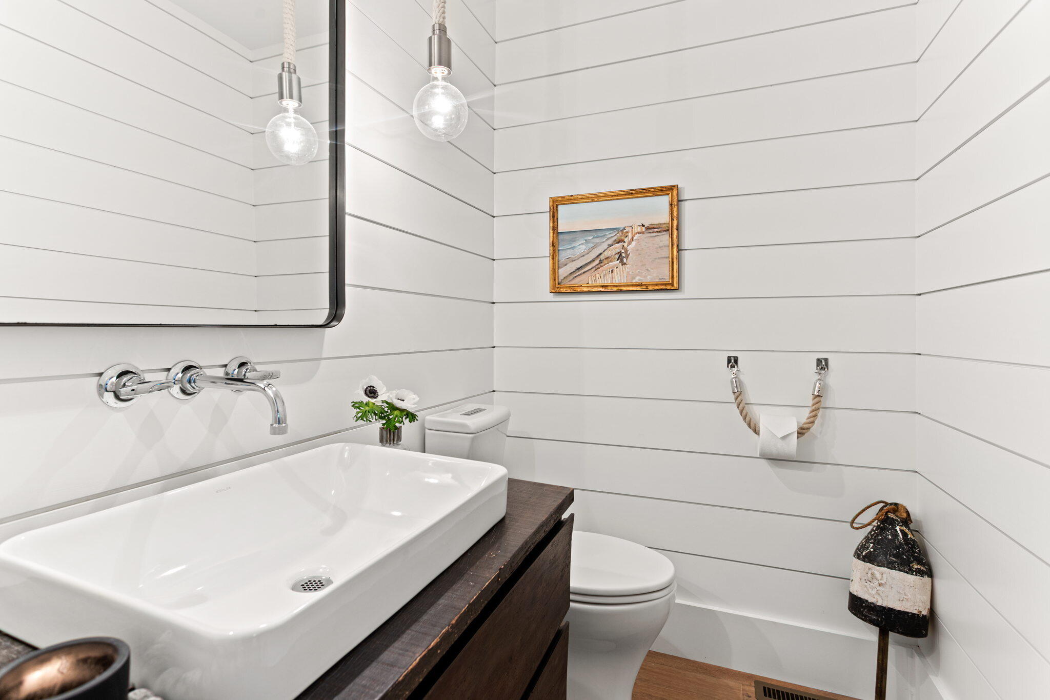 149 Old Stage Road Centerville, MA 02632 - Photo 34 of 69 a bathroom with a sink a toilet and a mirror