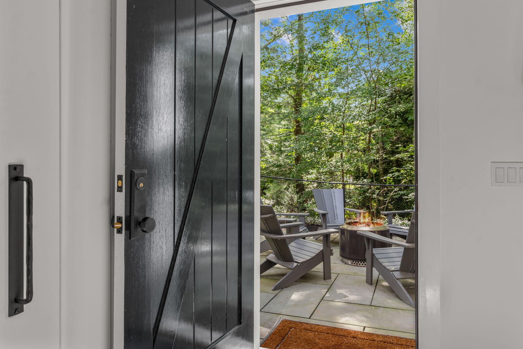 149 Old Stage Road Centerville, MA 02632 - Photo 45 of 69 a view of a porch with chairs and backyard