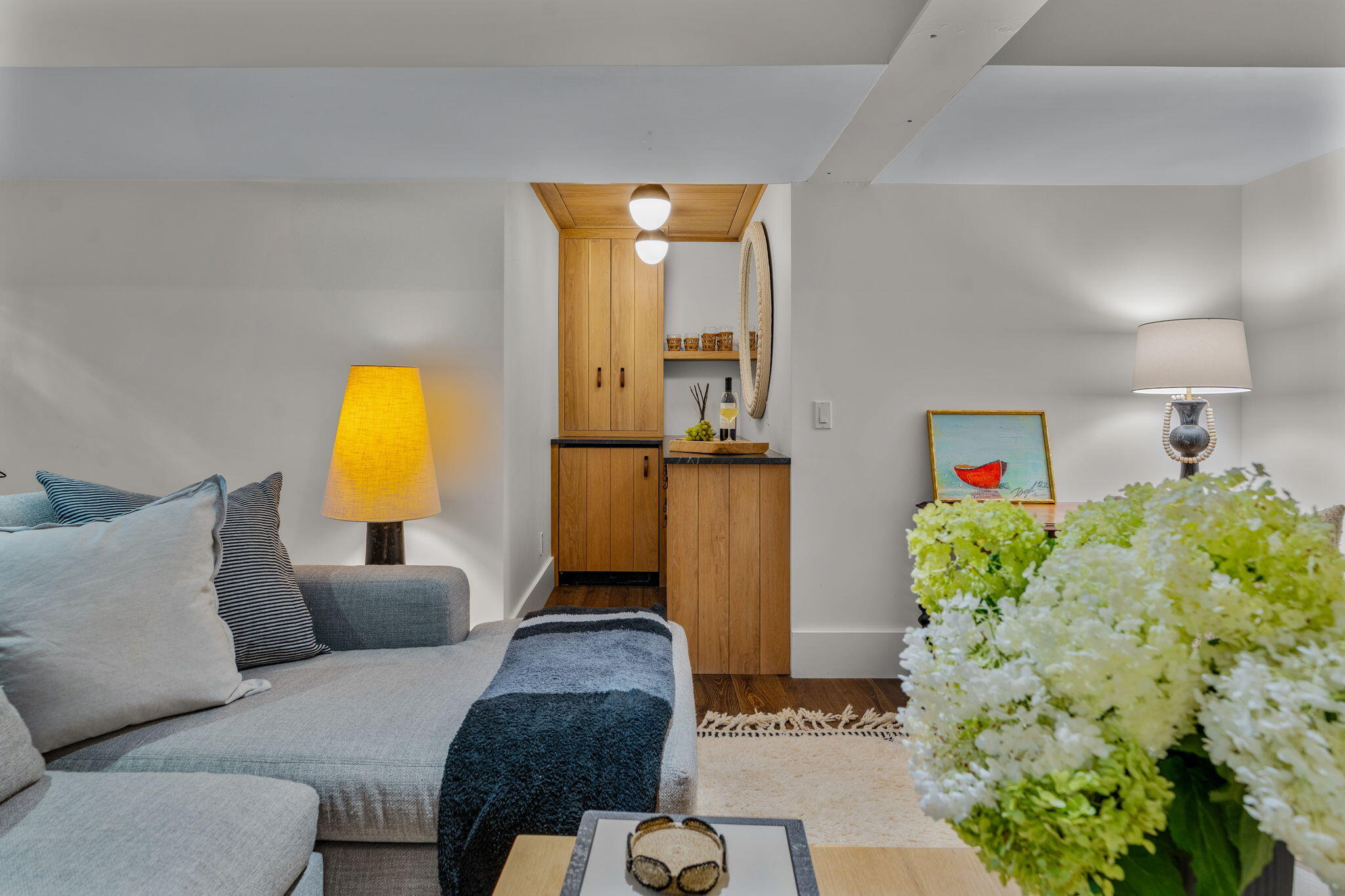 149 Old Stage Road Centerville, MA 02632 - Photo 46 of 69 a living room with furniture and a potted plant