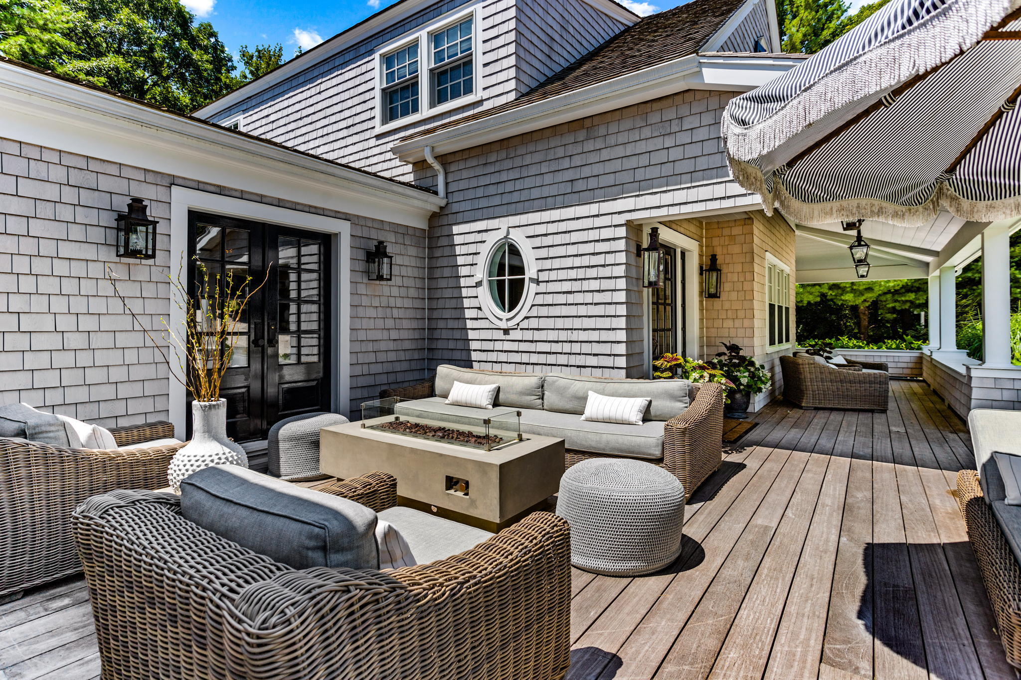 149 Old Stage Road Centerville, MA 02632 - Photo 7 of 69 a view of a patio with couches chairs and wooden floor