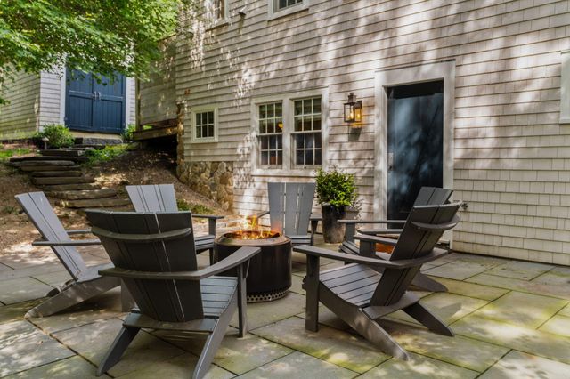 a view of balcony with wooden floor and stairs