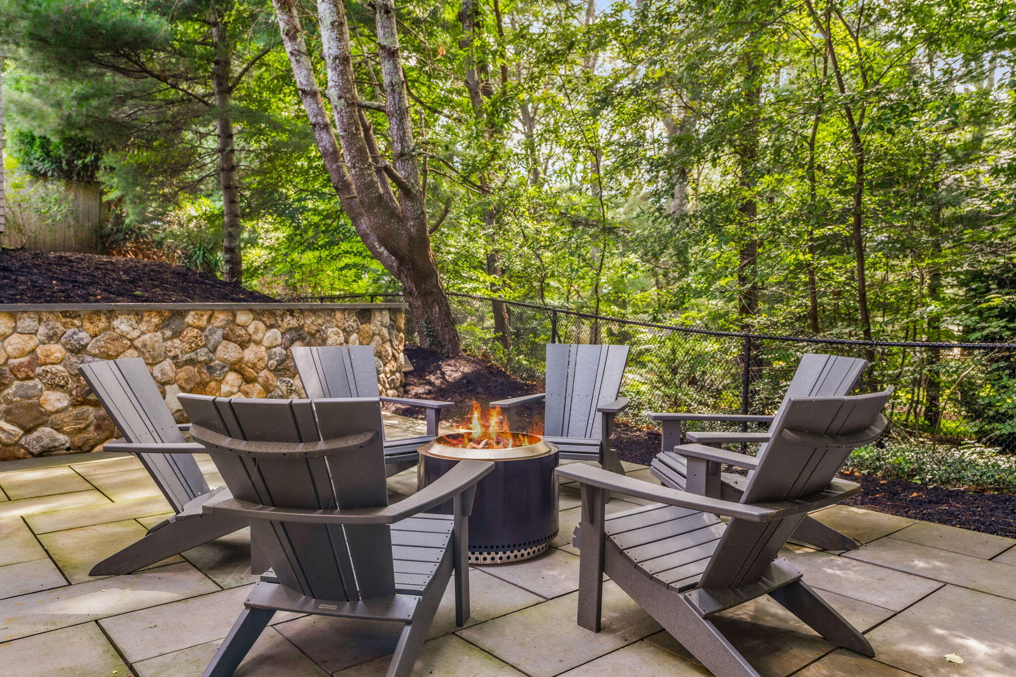 149 Old Stage Road Centerville, MA 02632 - Photo 10 of 69 a view of a chairs and table in the patio
