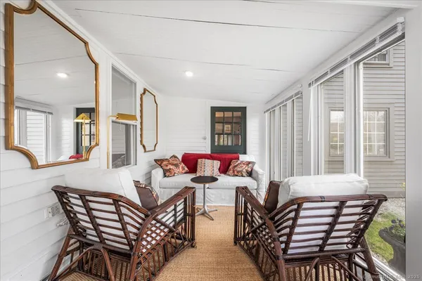 a bathroom with a sink a mirror and vanity