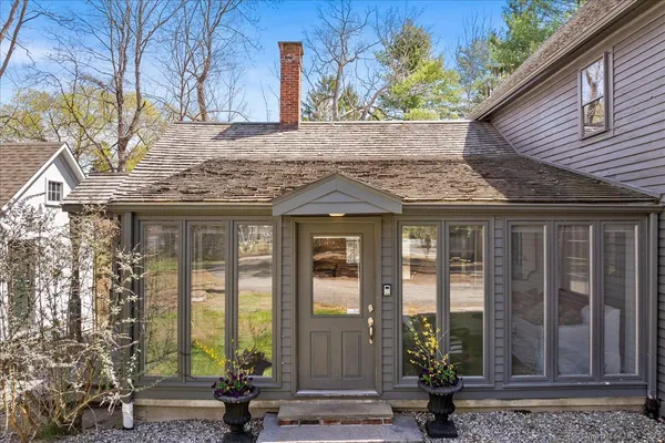 a view of house with a outdoor space